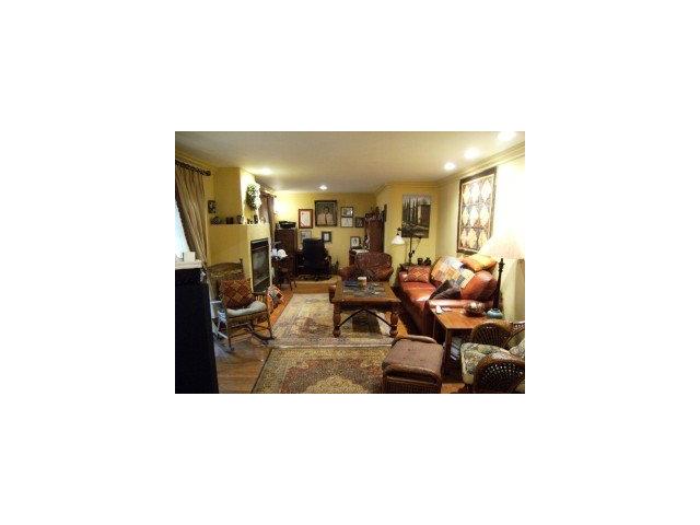 4077 Crest Road Pebble Beach, CA 93953 - Photo 7 of 8 a living room with furniture and a potted plant