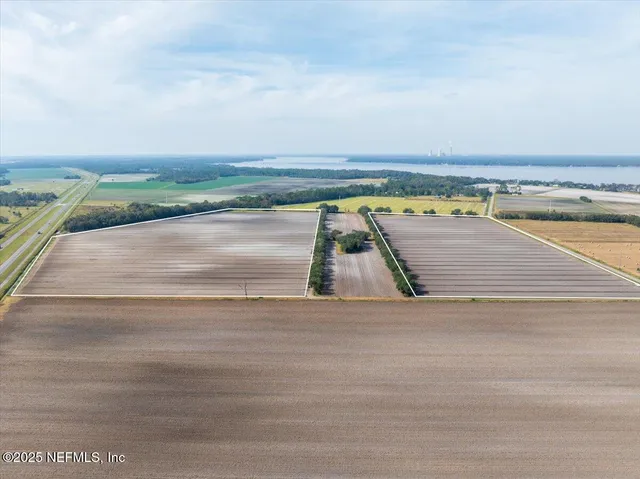 a view of a swimming pool with an ocean view
