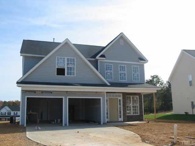 129 Longbay Street Garner, NC 27529 - Photo 2 of 2 a front view of a house with yard