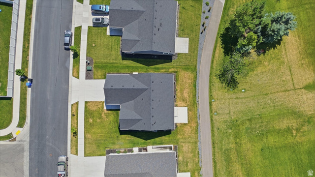 730 West 500 North Smithfield, UT 84335 - Photo 39 of 46 Aerial perspective showcasing residential properties with dark shingled roofs and green lawns