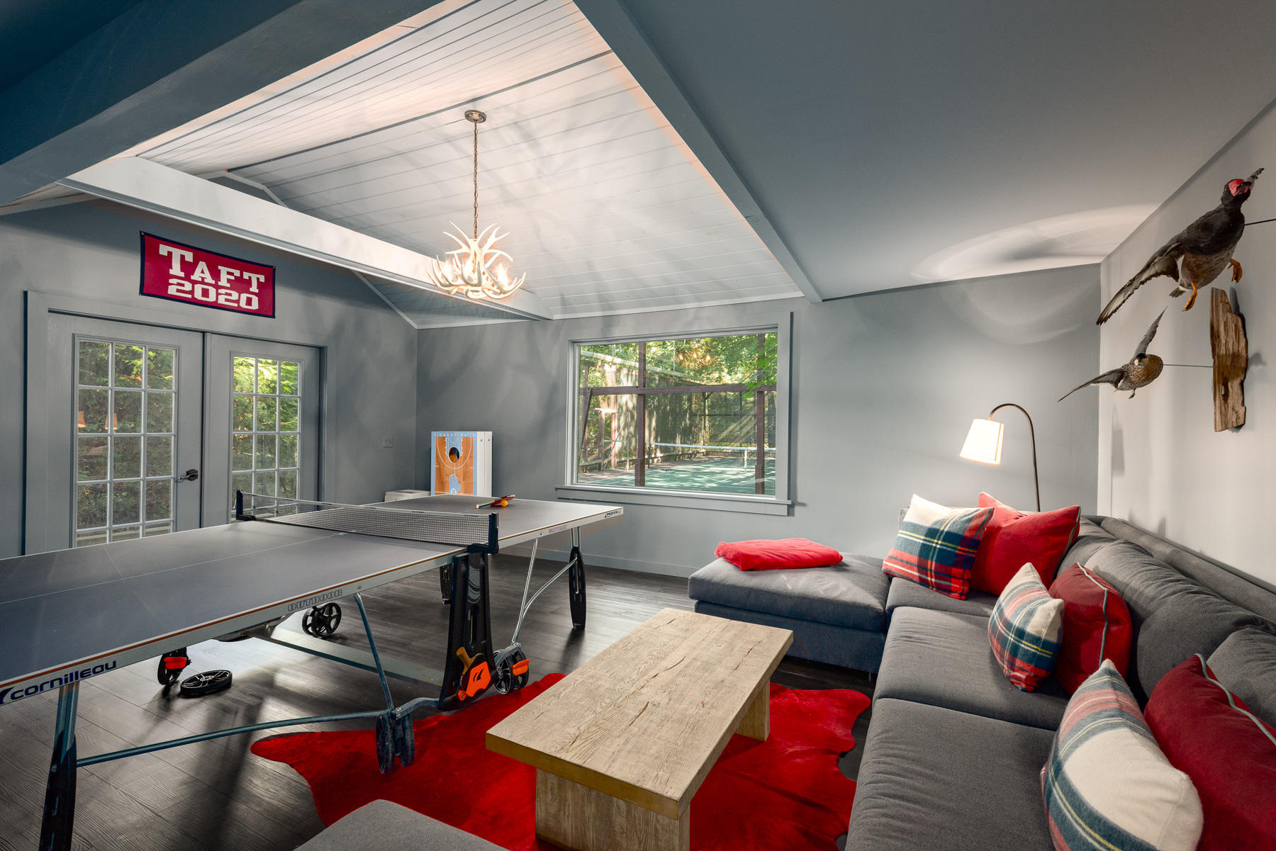 10 Meadowbrook Road Darien, CT 06820 - Photo 31 of 42 a living room with furniture a window and a chandelier