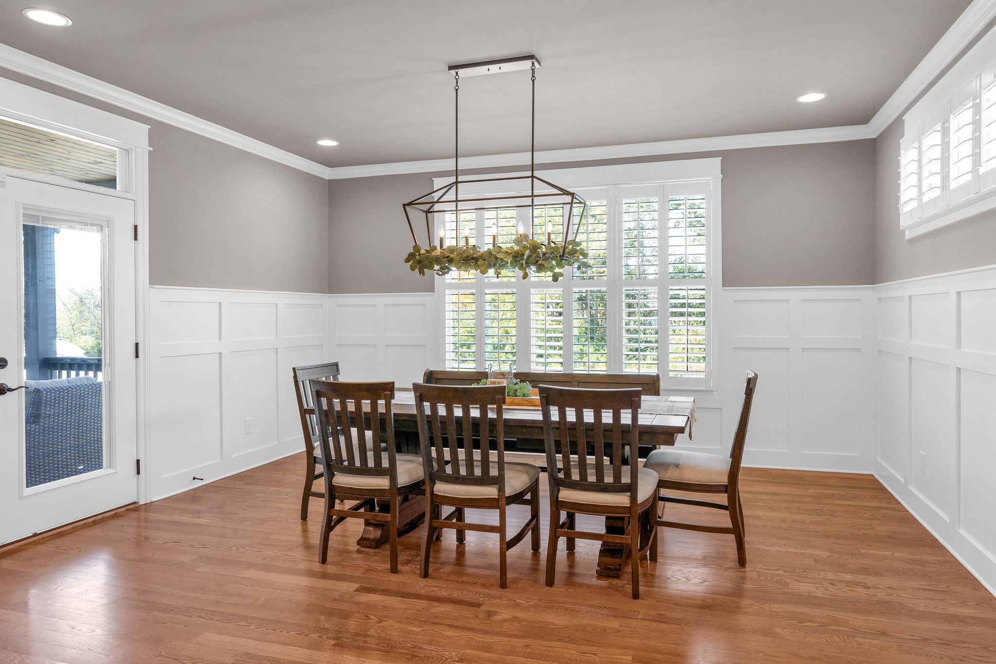 1032 Abbey Rd Way Spring Hill, TN 37174 - Photo 20 of 51 a view of a dining room with furniture wooden floor and chandelier