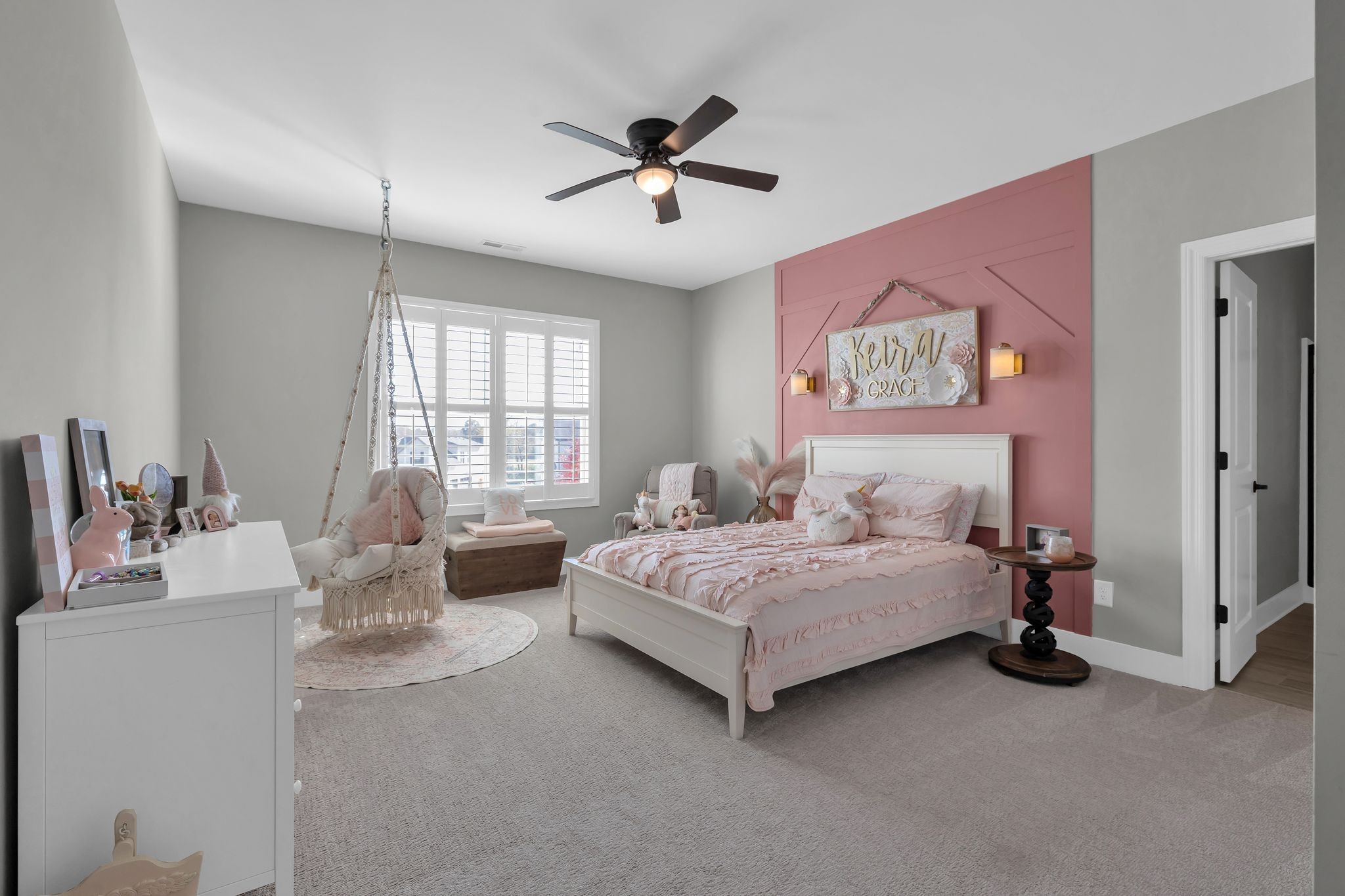 1032 Abbey Rd Way Spring Hill, TN 37174 - Photo 37 of 51 a spacious bedroom with a bed and a couch