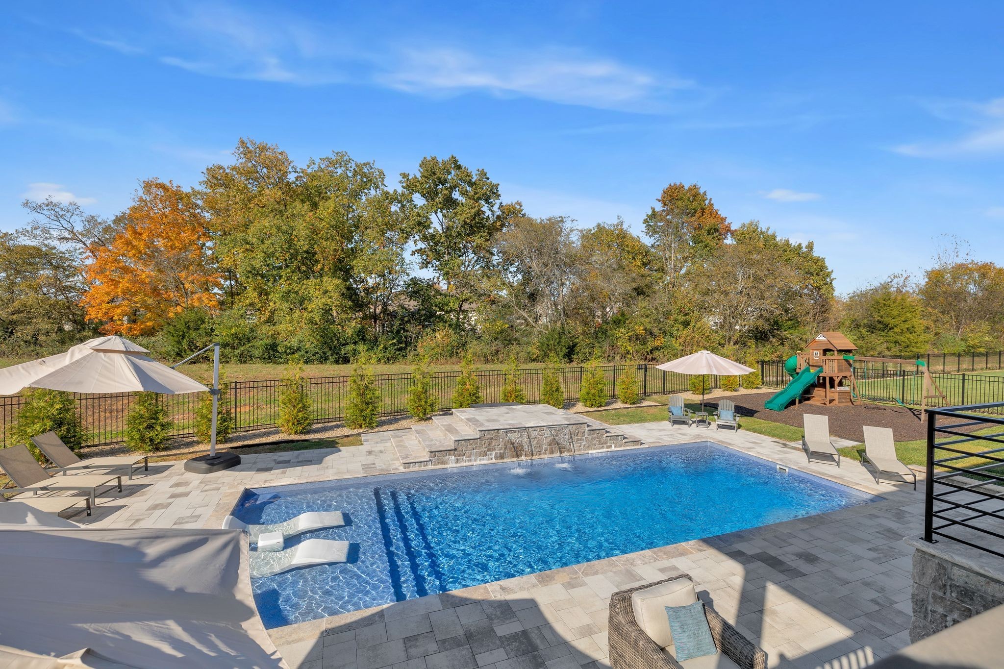 1032 Abbey Rd Way Spring Hill, TN 37174 - Photo 42 of 51 a view of a swimming pool with a patio