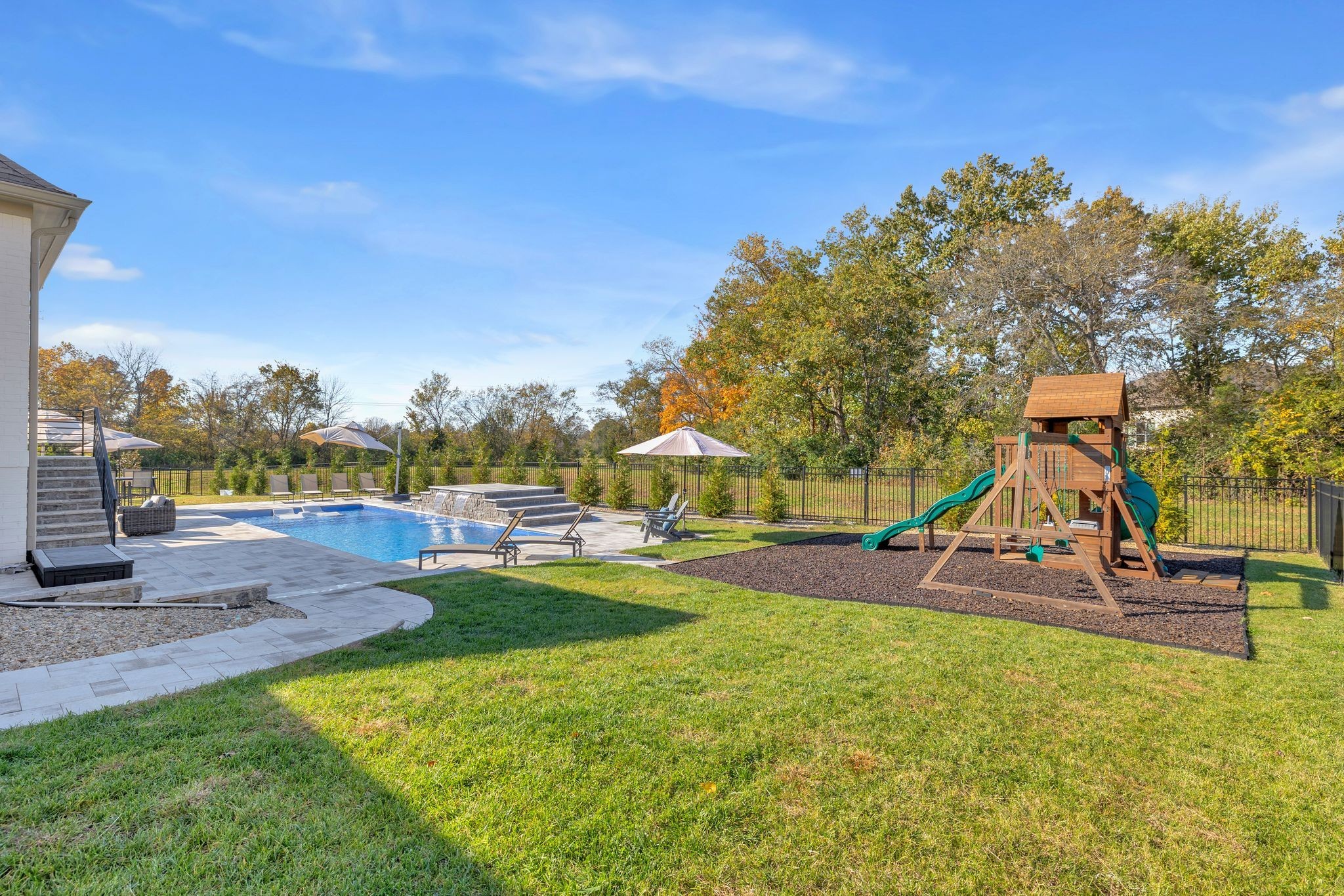 1032 Abbey Rd Way Spring Hill, TN 37174 - Photo 49 of 51 a view of a park with swings and slides