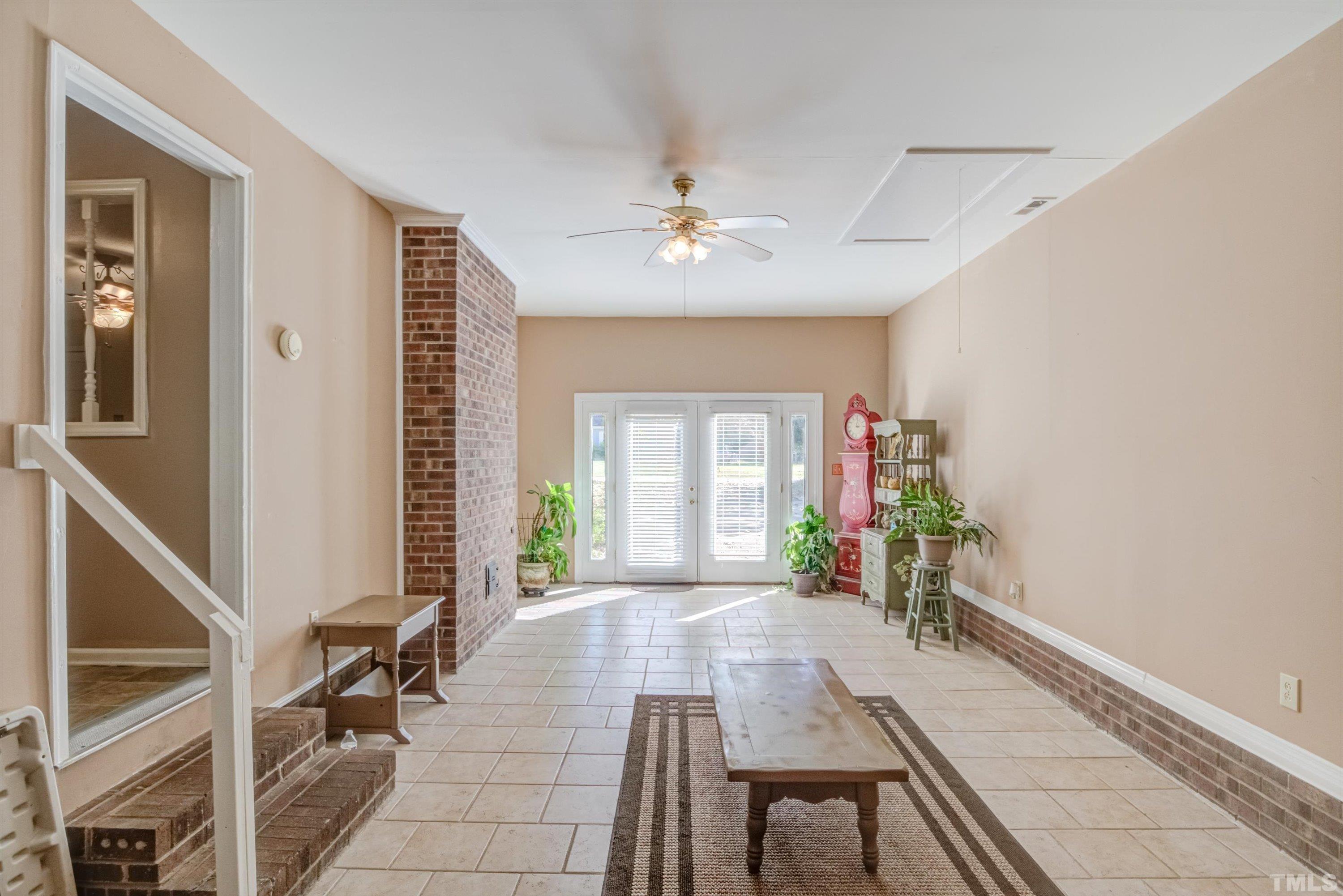 5149 Shield Circle Raleigh, NC 27603 - Photo 26 of 41 a view of a livingroom with furniture window and wooden floor