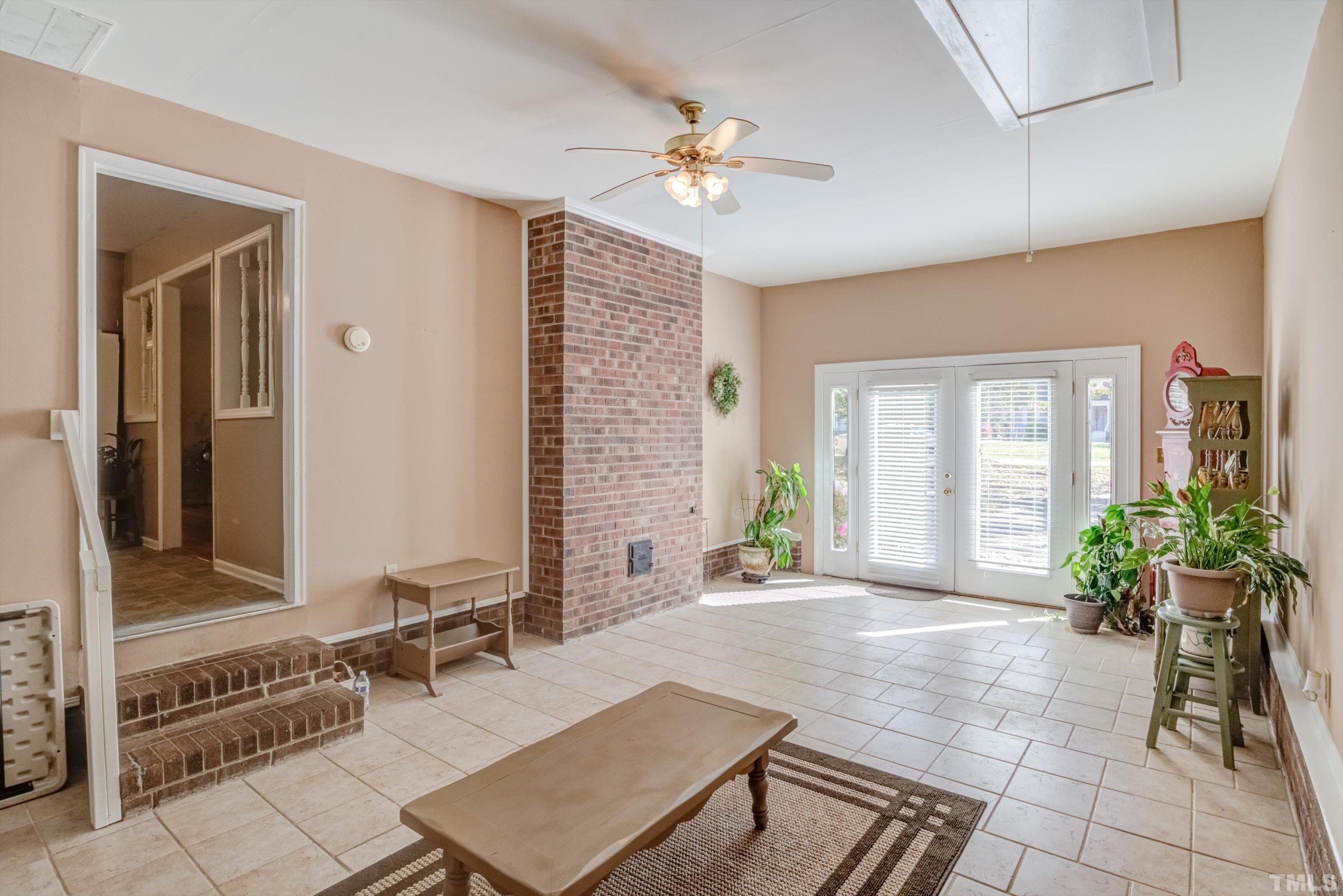 5149 Shield Circle Raleigh, NC 27603 - Photo 27 of 41 a living room with furniture and potted plants