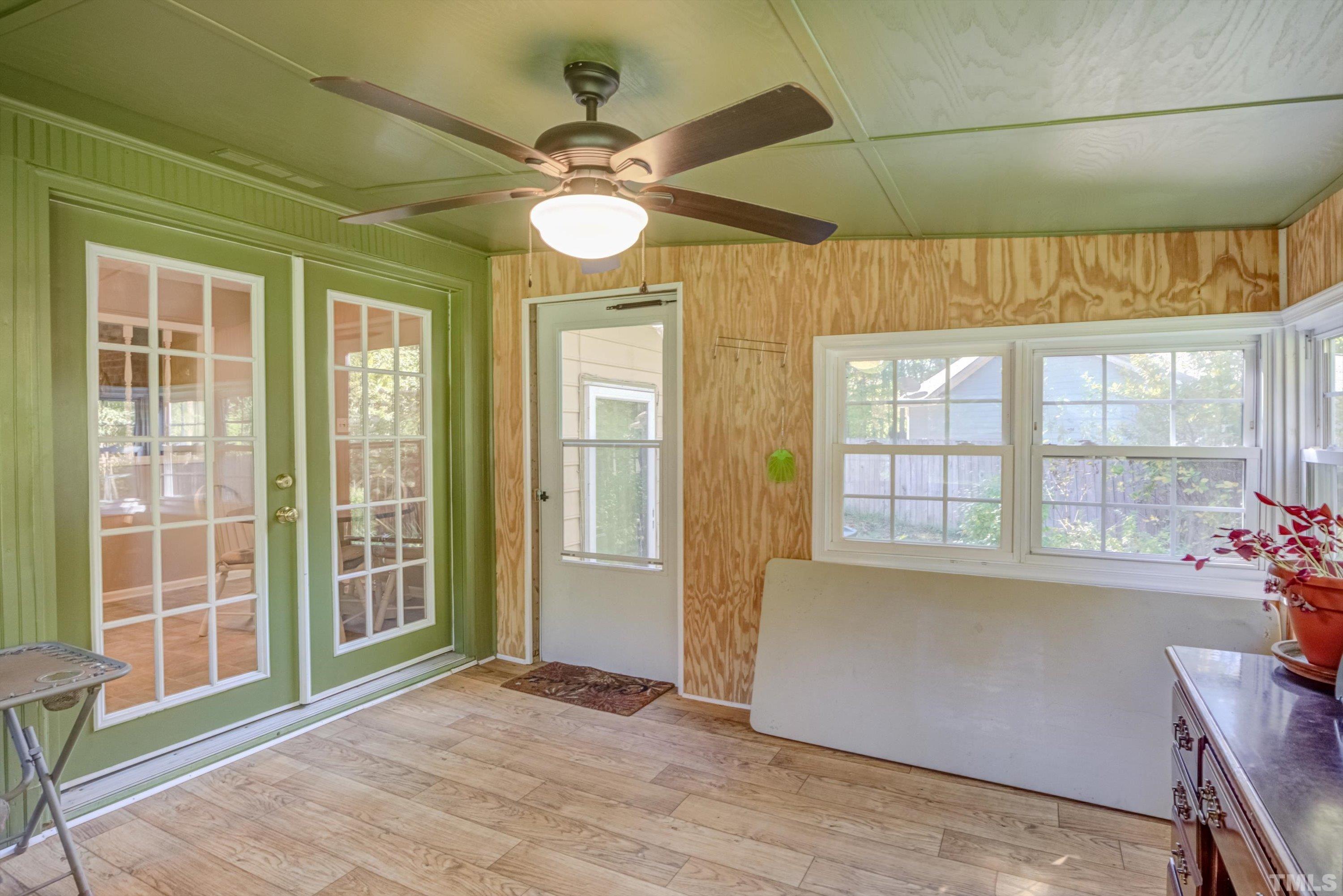 5149 Shield Circle Raleigh, NC 27603 - Photo 31 of 41 a view of an empty room with a window and wooden floor