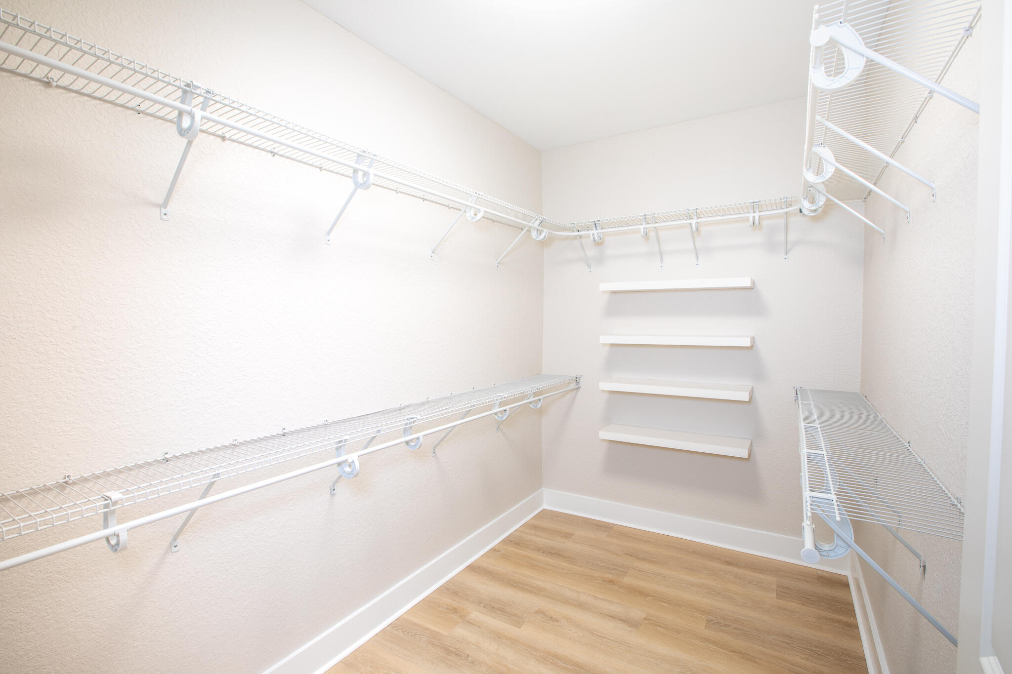 995 Airport Road, Unit 54 Destin, FL 32541 - Photo 17 of 31 a view of an empty walk in closet