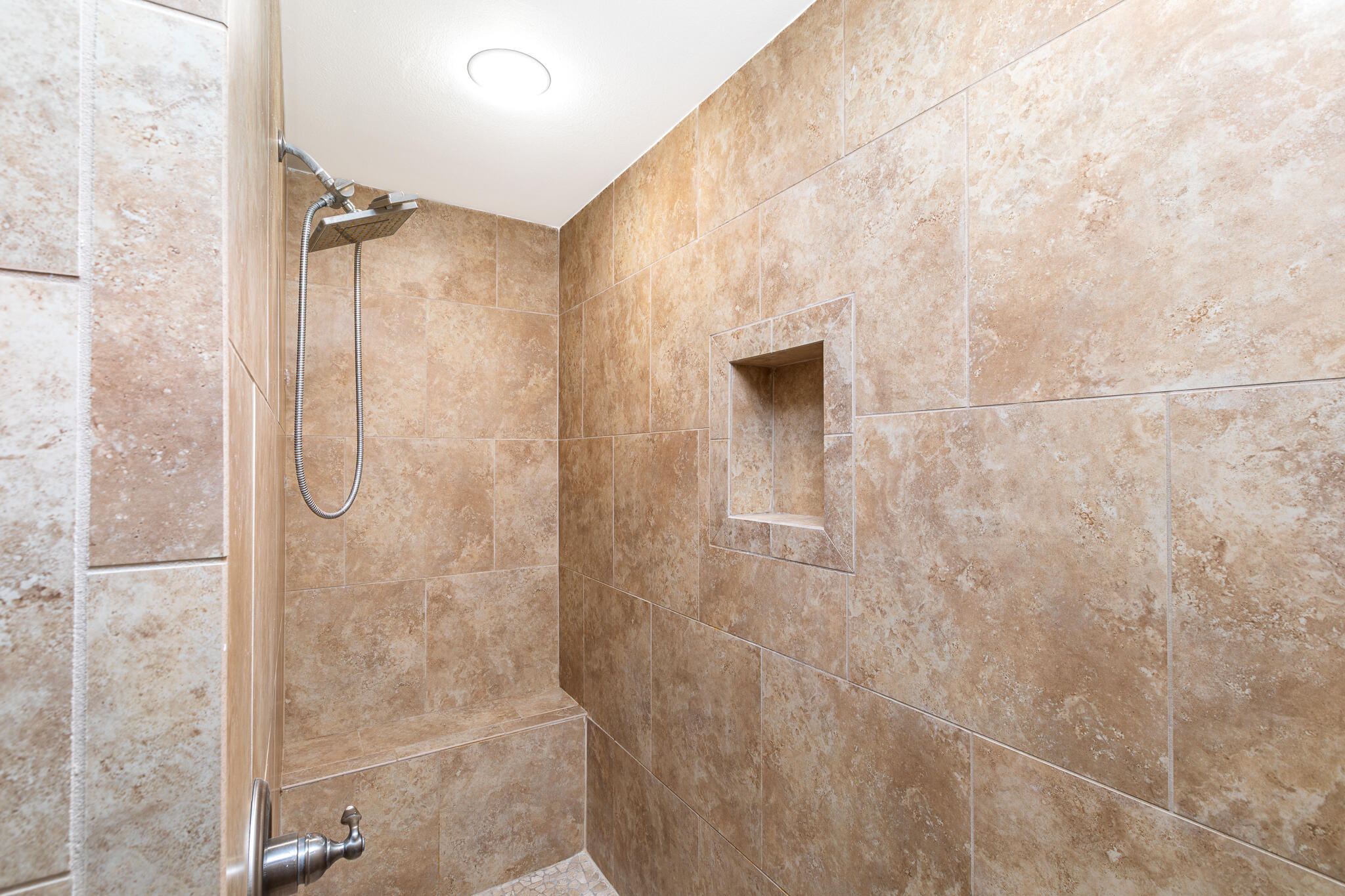 995 Airport Road, Unit 54 Destin, FL 32541 - Photo 20 of 31 a bathroom with a shower