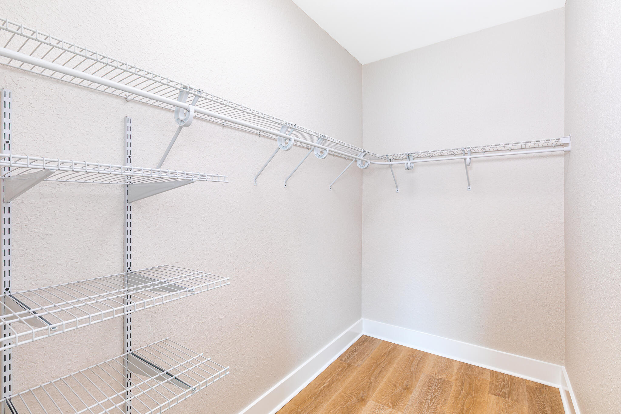 995 Airport Road, Unit 54 Destin, FL 32541 - Photo 25 of 31 a view of a room with racks on the wall