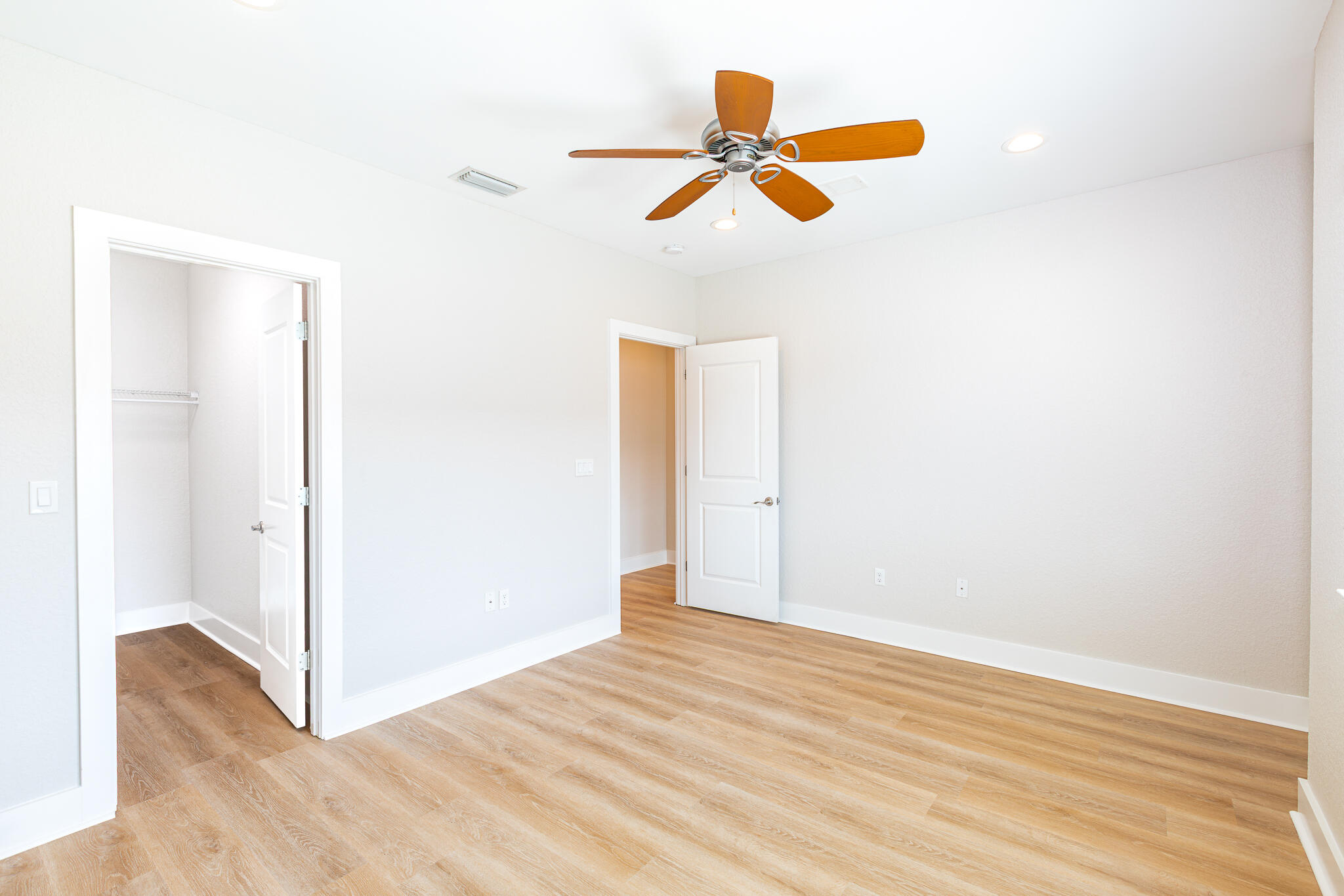 995 Airport Road, Unit 54 Destin, FL 32541 - Photo 26 of 31 a view of empty room with wooden floor