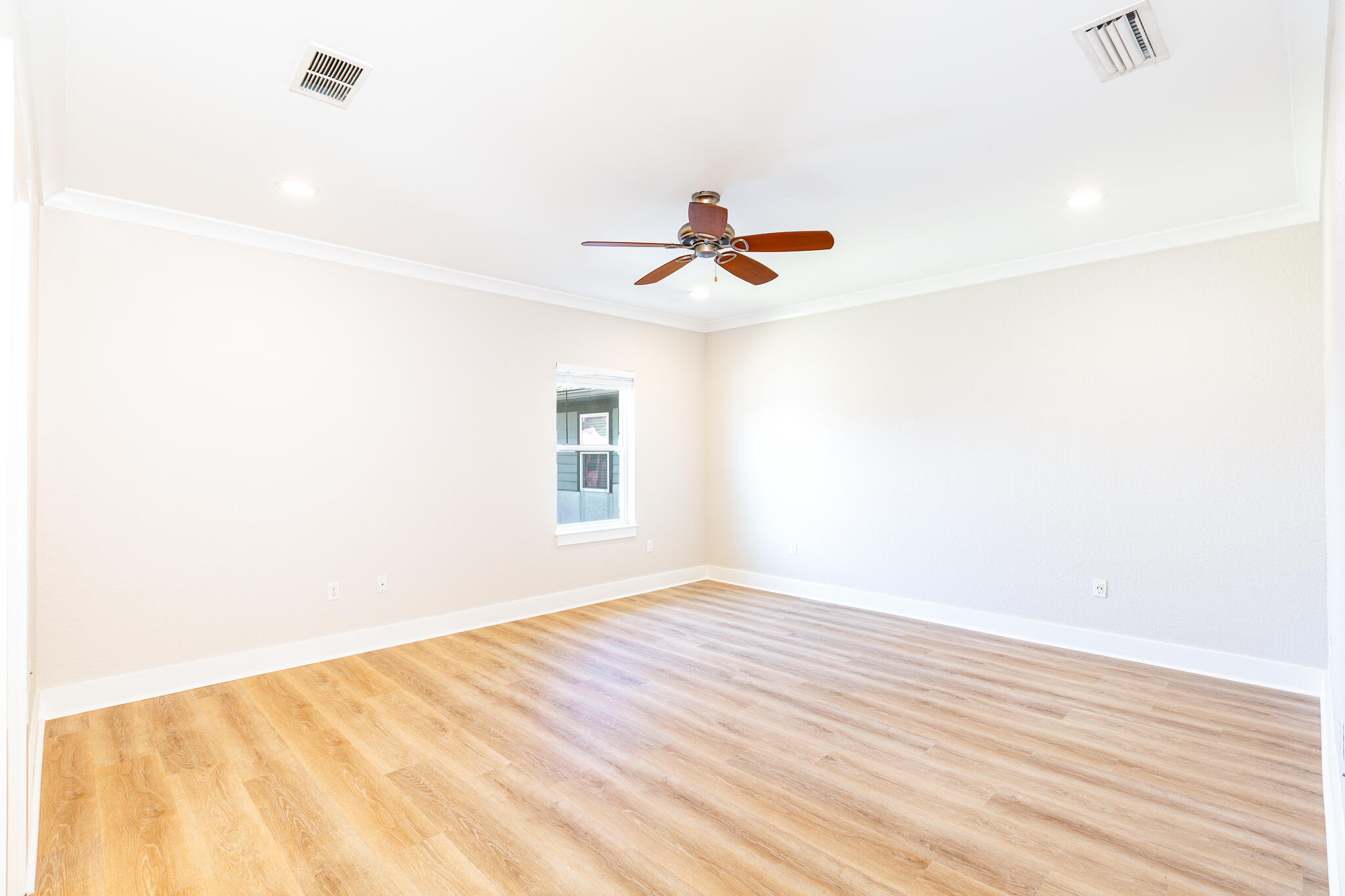 995 Airport Road, Unit 54 Destin, FL 32541 - Photo 27 of 31 a view of empty room with wooden floor