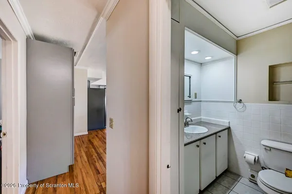a room with furniture and flat screen tv