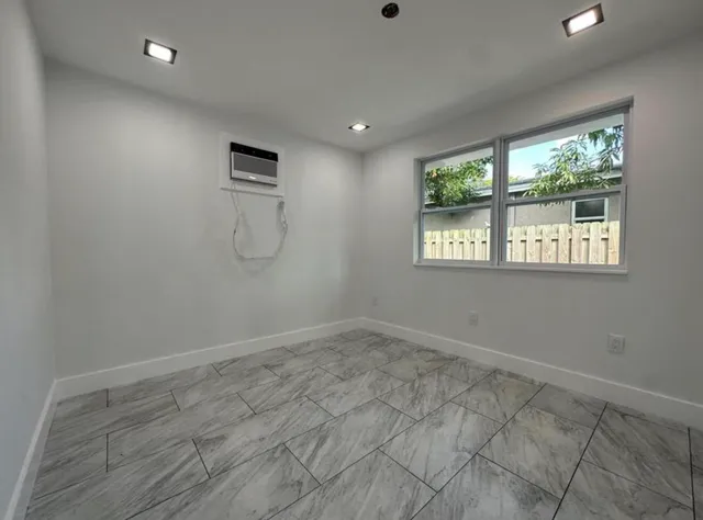 an empty room with windows