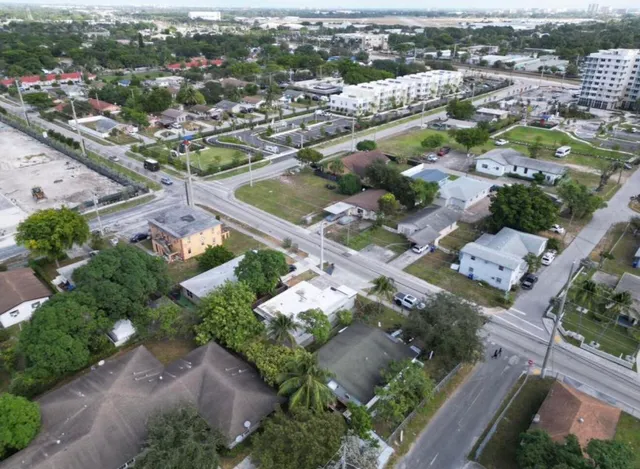 an aerial view of a city with lots of residential buildings