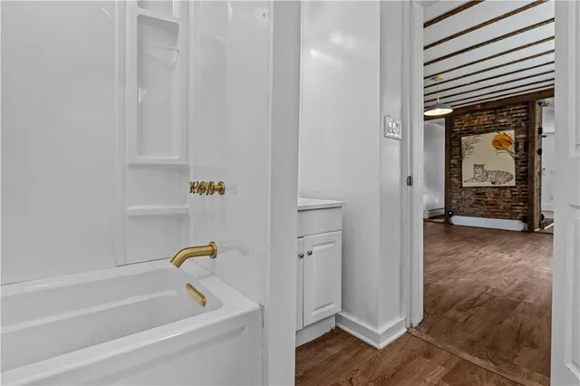 a bathroom with a bathtub