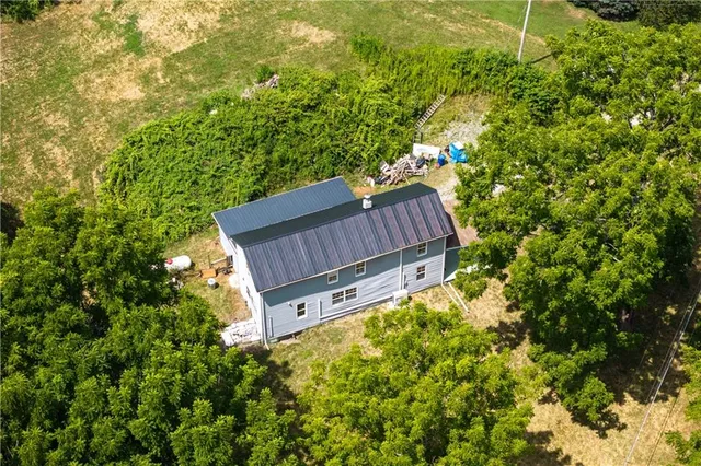 a backyard of a house with lots of green space