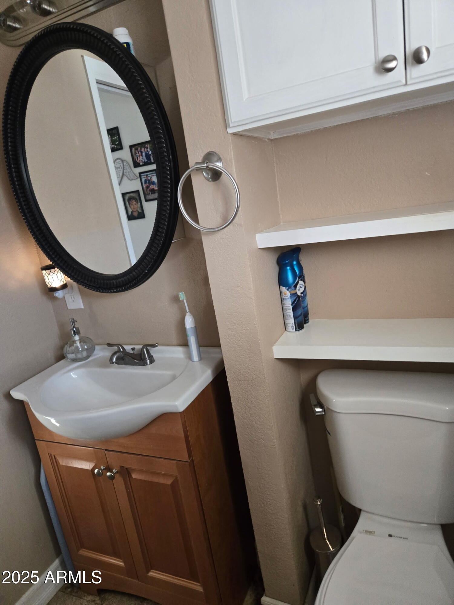2209 West Klamath Avenue Apache Junction, AZ 85119 - Photo 25 of 30 a bathroom with a sink and a mirror