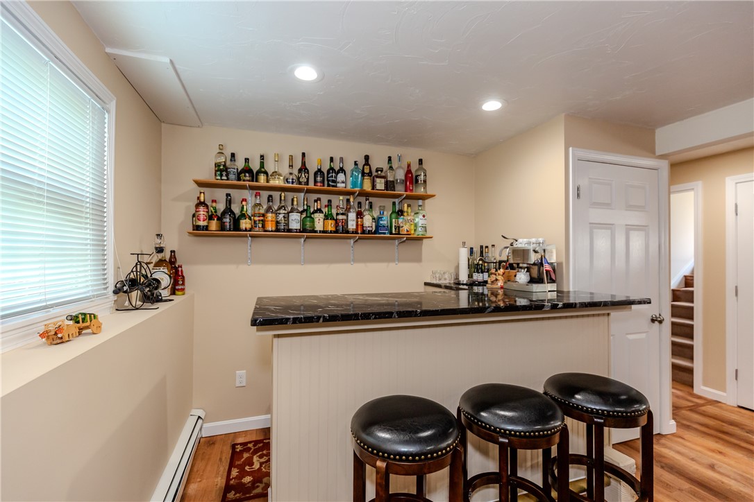 99 Tower Hill Road Cumberland, RI 02864 - Photo 25 of 43 Convenient wet bar, perfect for entertaining and serving guests.