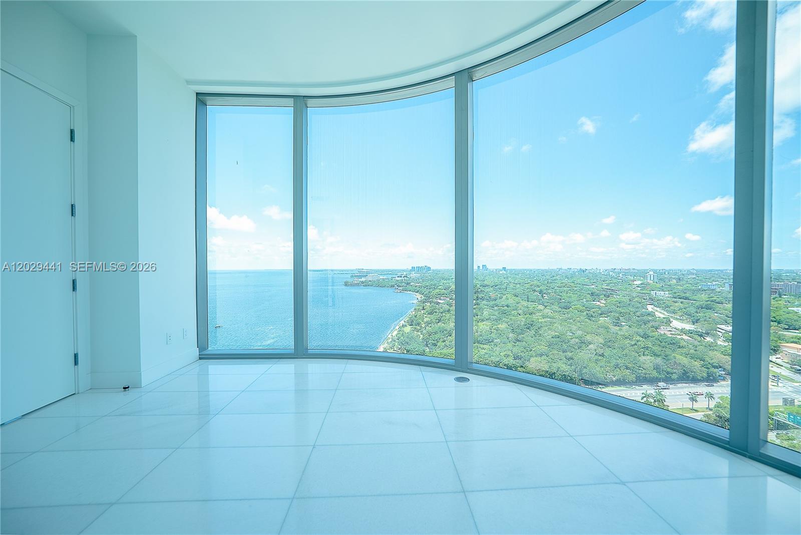 175 Southeast 25th Road, Unit 2103 Miami, FL 33129 - Photo 21 of 27 a view of an empty room and window