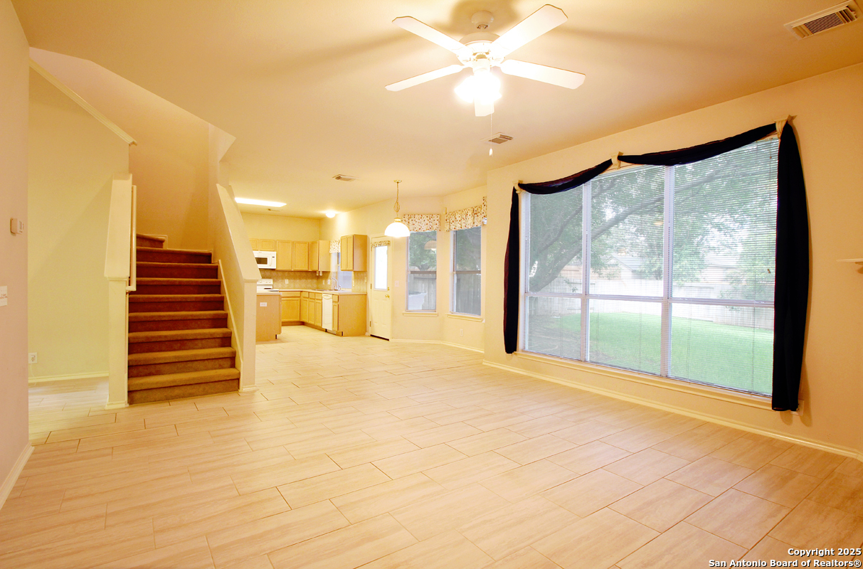 2703 Rio Brazos San Antonio, TX 78259 - Photo 11 of 34 a view of an empty room with a fireplace