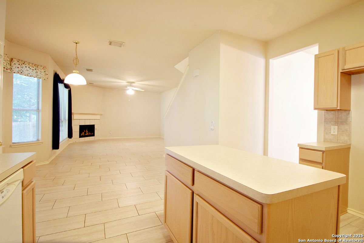 2703 Rio Brazos San Antonio, TX 78259 - Photo 14 of 34 a kitchen with a stove and a refrigerator