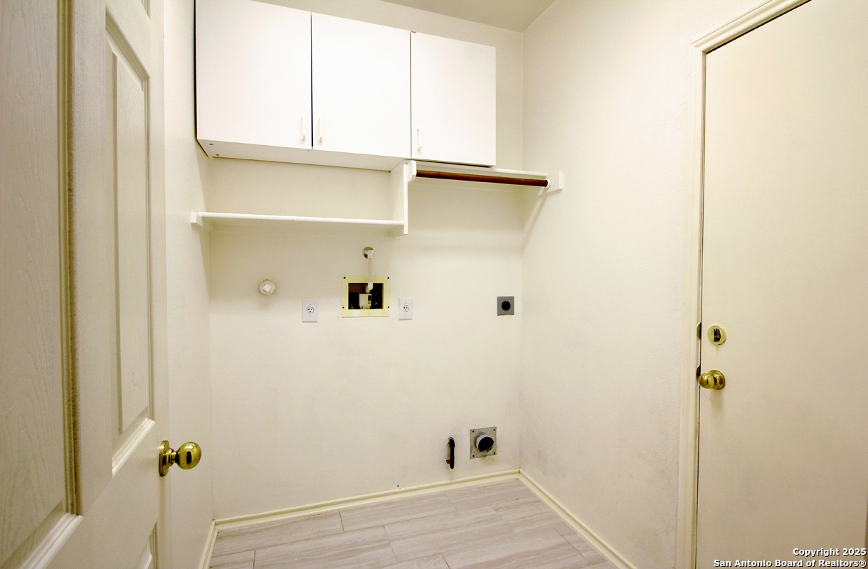 2703 Rio Brazos San Antonio, TX 78259 - Photo 18 of 34 a view of small space with racks on the wall