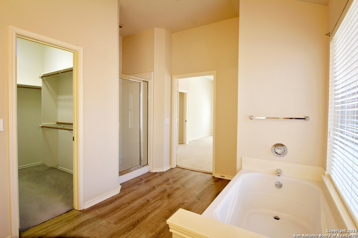 2703 Rio Brazos San Antonio, TX 78259 - Photo 22 of 34 a bathroom with a bathtub and a sink
