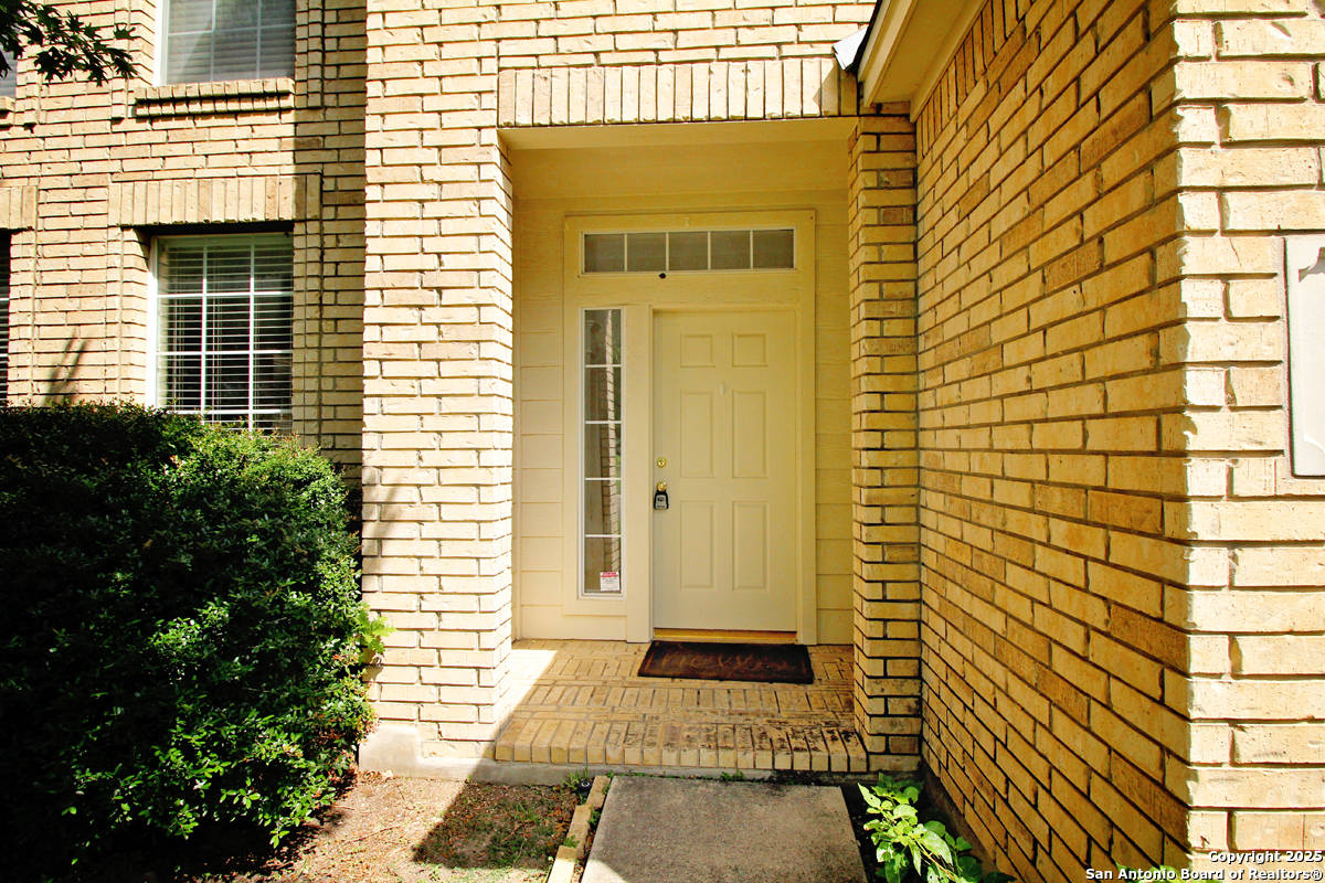 2703 Rio Brazos San Antonio, TX 78259 - Photo 3 of 34 a view of a entryway door front of house