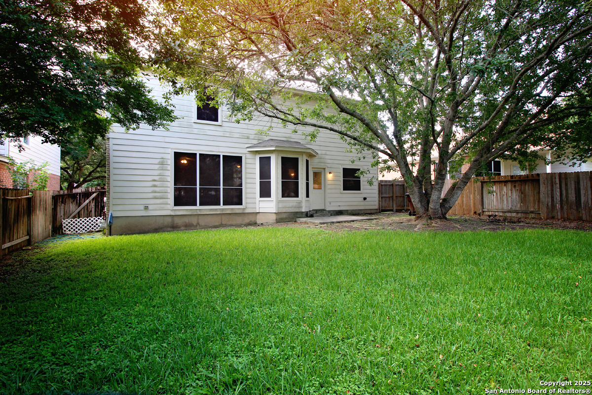 2703 Rio Brazos San Antonio, TX 78259 - Photo 34 of 34 a front view of house with yard and green space