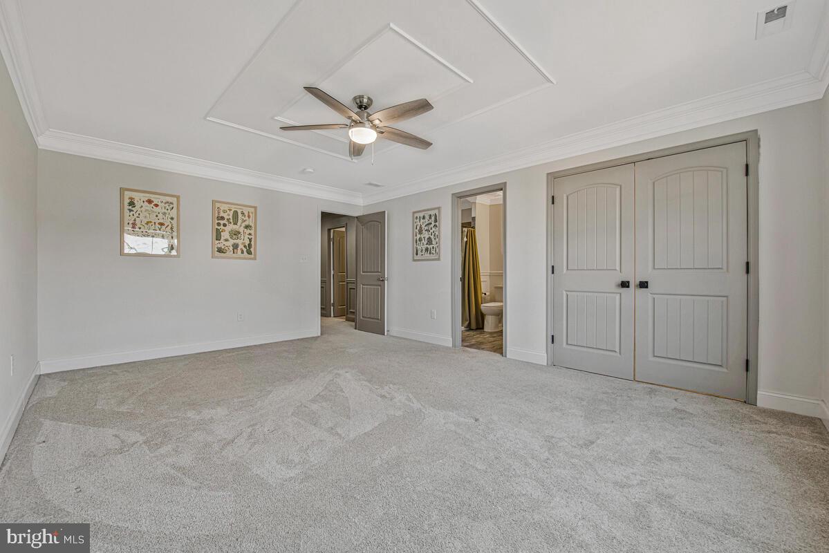 941 8th Street Pasadena, MD 21122 - Photo 22 of 41 a view of an empty room with a window