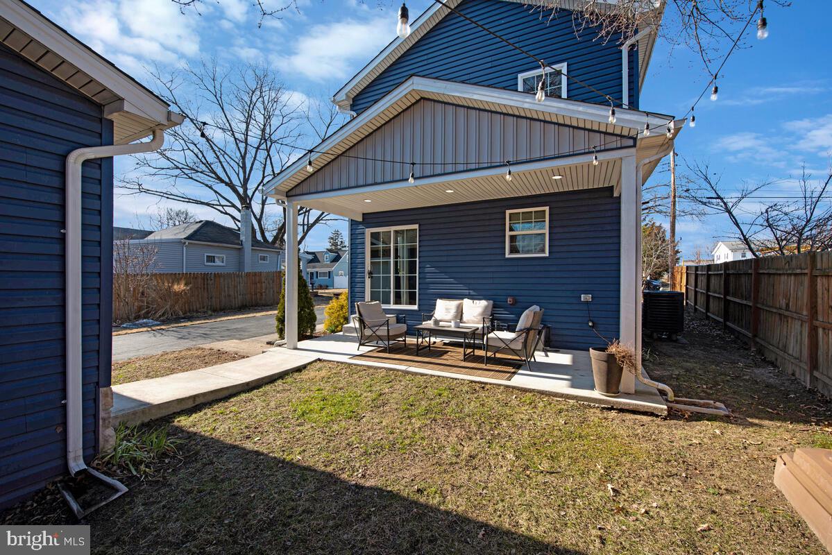 941 8th Street Pasadena, MD 21122 - Photo 37 of 41 a view of house with backyard space and balcony
