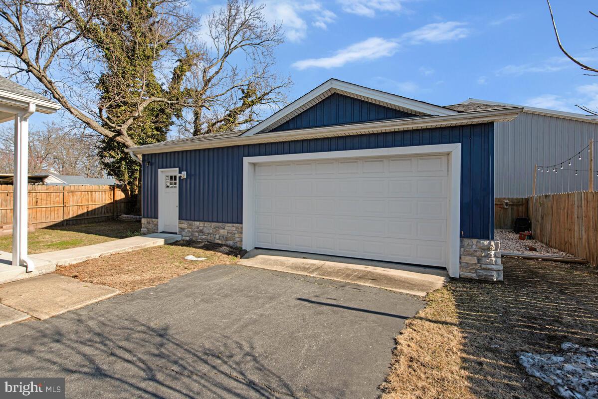 941 8th Street Pasadena, MD 21122 - Photo 41 of 41 a front view of a house with a yard
