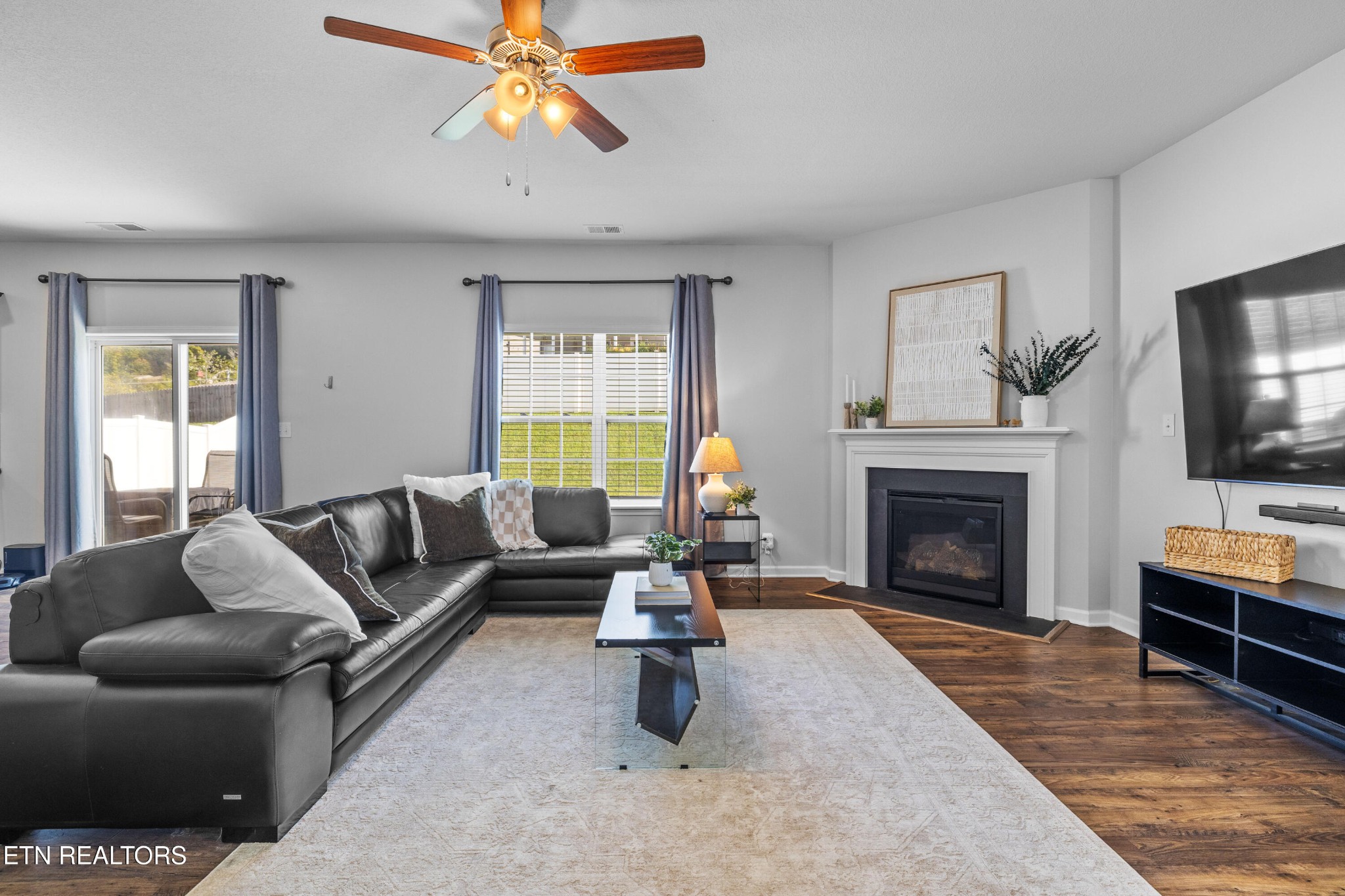 6150 Pembridge Road Knoxville, TN 37912 - Photo 5 of 34 a living room with furniture or fireplace and a flat screen tv