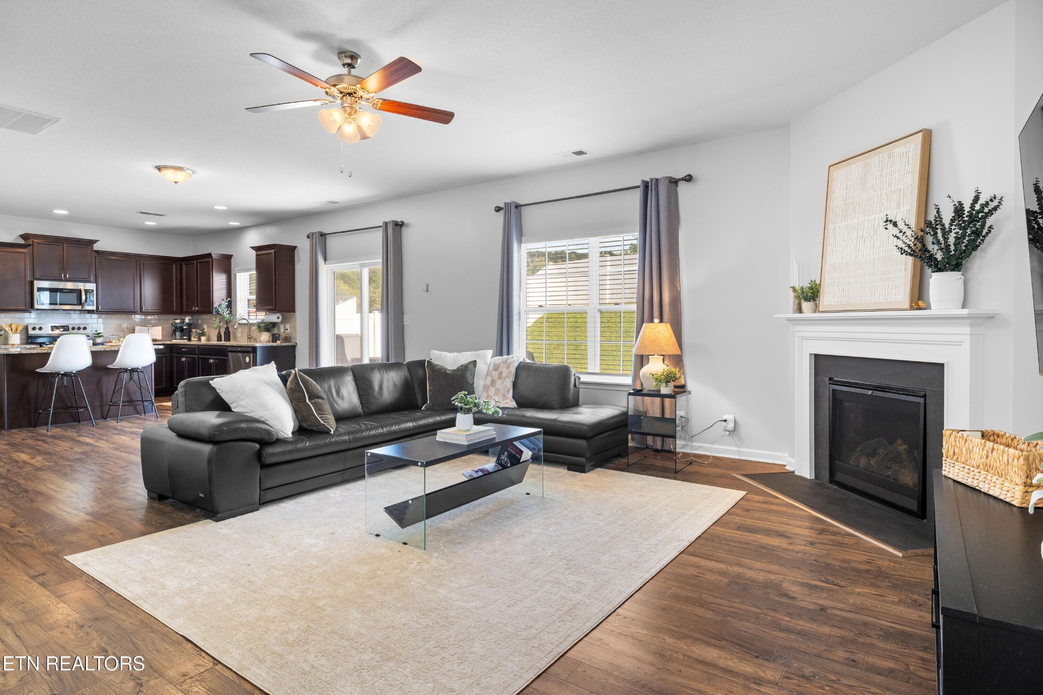 6150 Pembridge Road Knoxville, TN 37912 - Photo 7 of 34 a living room with furniture and a fireplace
