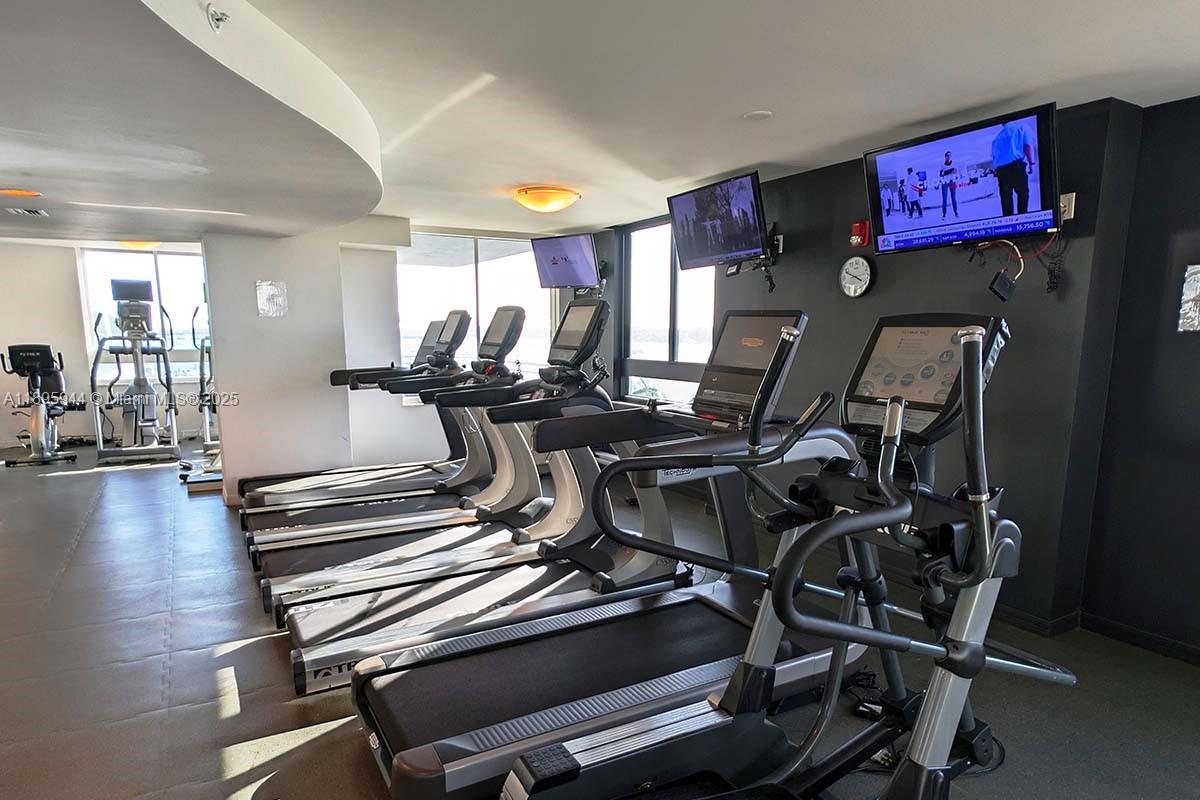 1330 West Avenue, Unit 1613 Miami Beach, FL 33139 - Photo 18 of 20 a view of a room with gym equipment