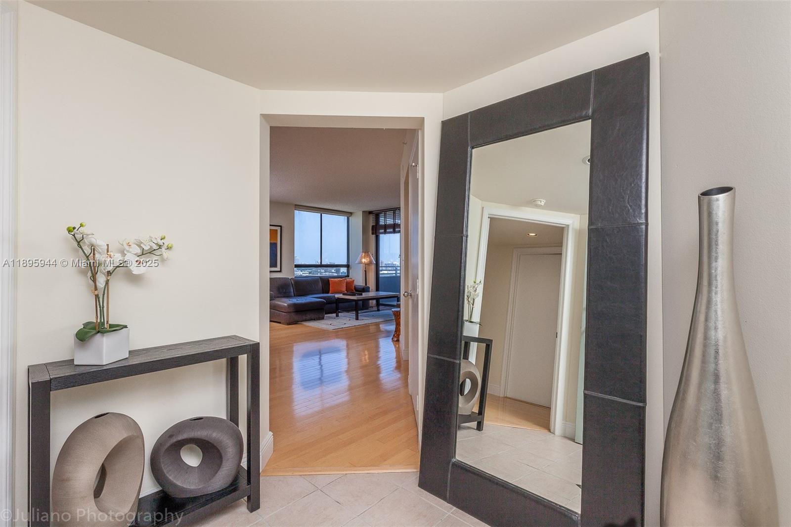 1330 West Avenue, Unit 1613 Miami Beach, FL 33139 - Photo 10 of 20 a view of living room washer and dryer