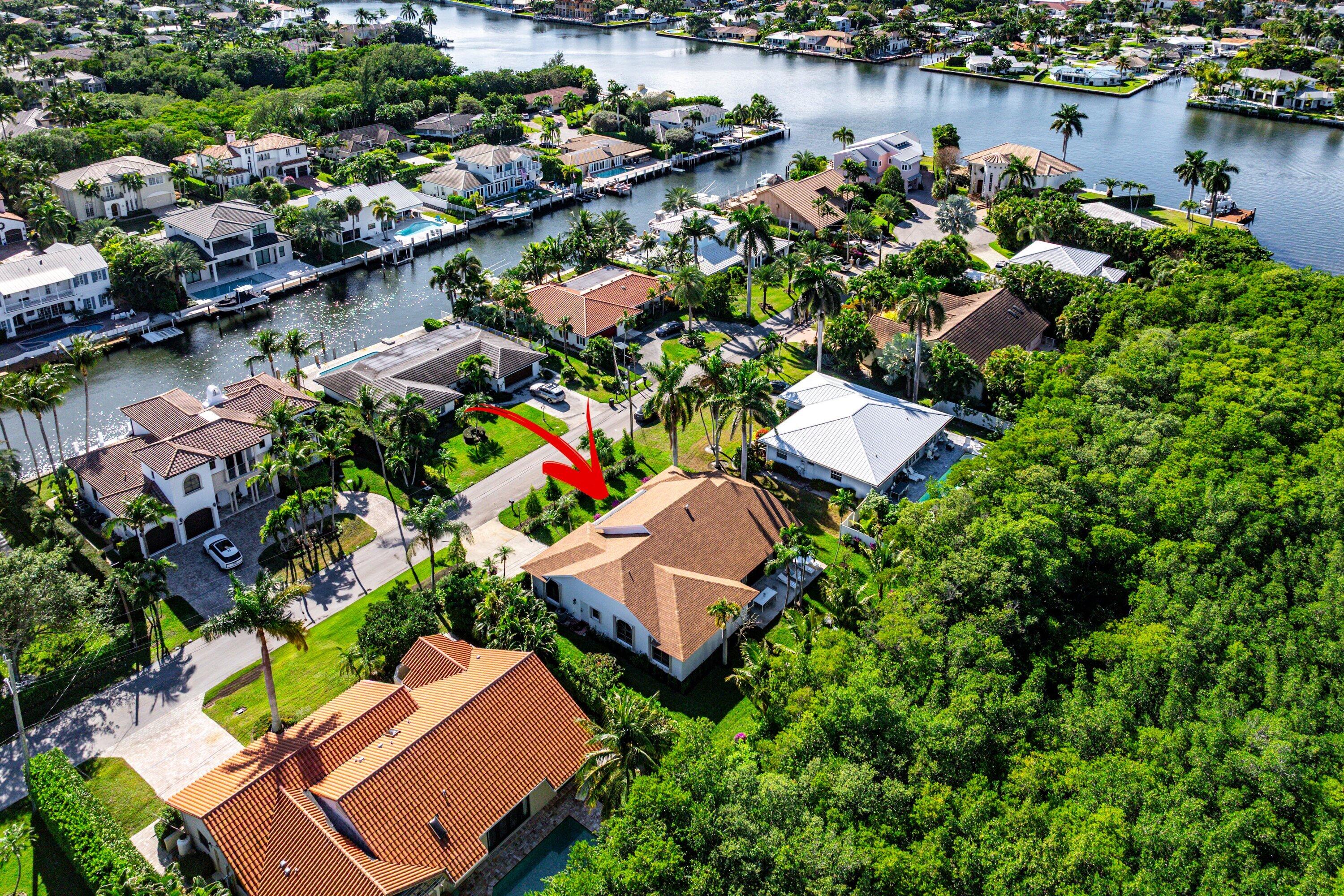 48 Harbour Drive North Ocean Ridge, FL 33435 - Photo 1 of 25 an aerial view of a house with a lake view