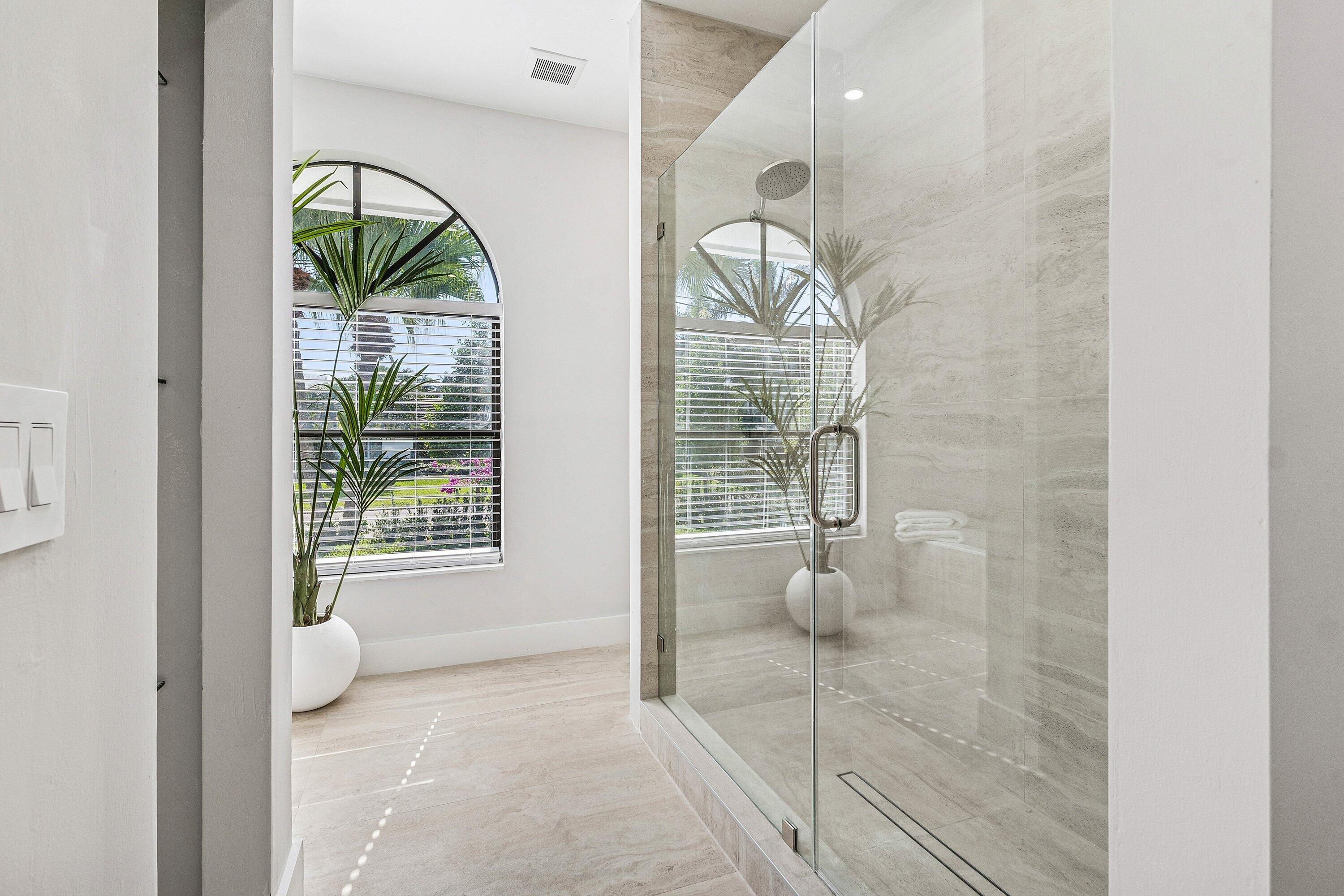 48 Harbour Drive North Ocean Ridge, FL 33435 - Photo 12 of 25 a view of empty room with wooden floor and fan