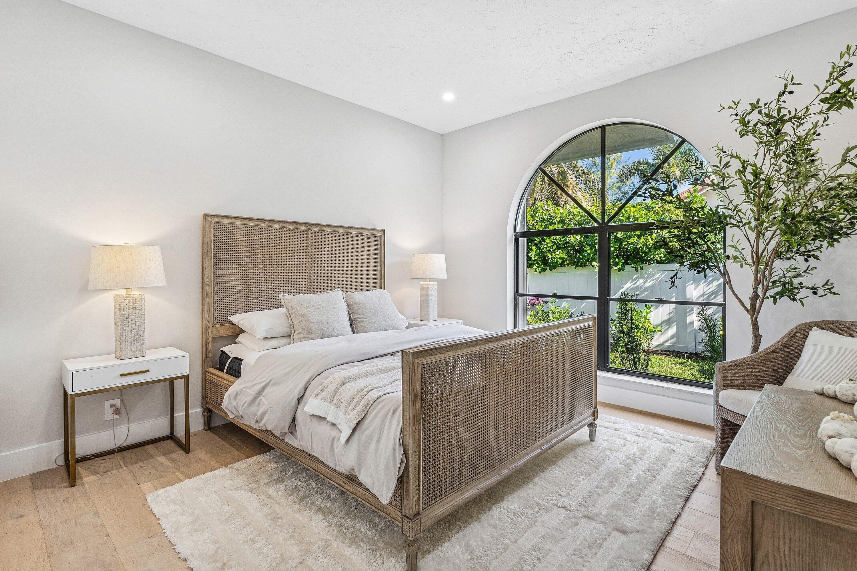 48 Harbour Drive North Ocean Ridge, FL 33435 - Photo 13 of 25 a living room with a bed and a large window