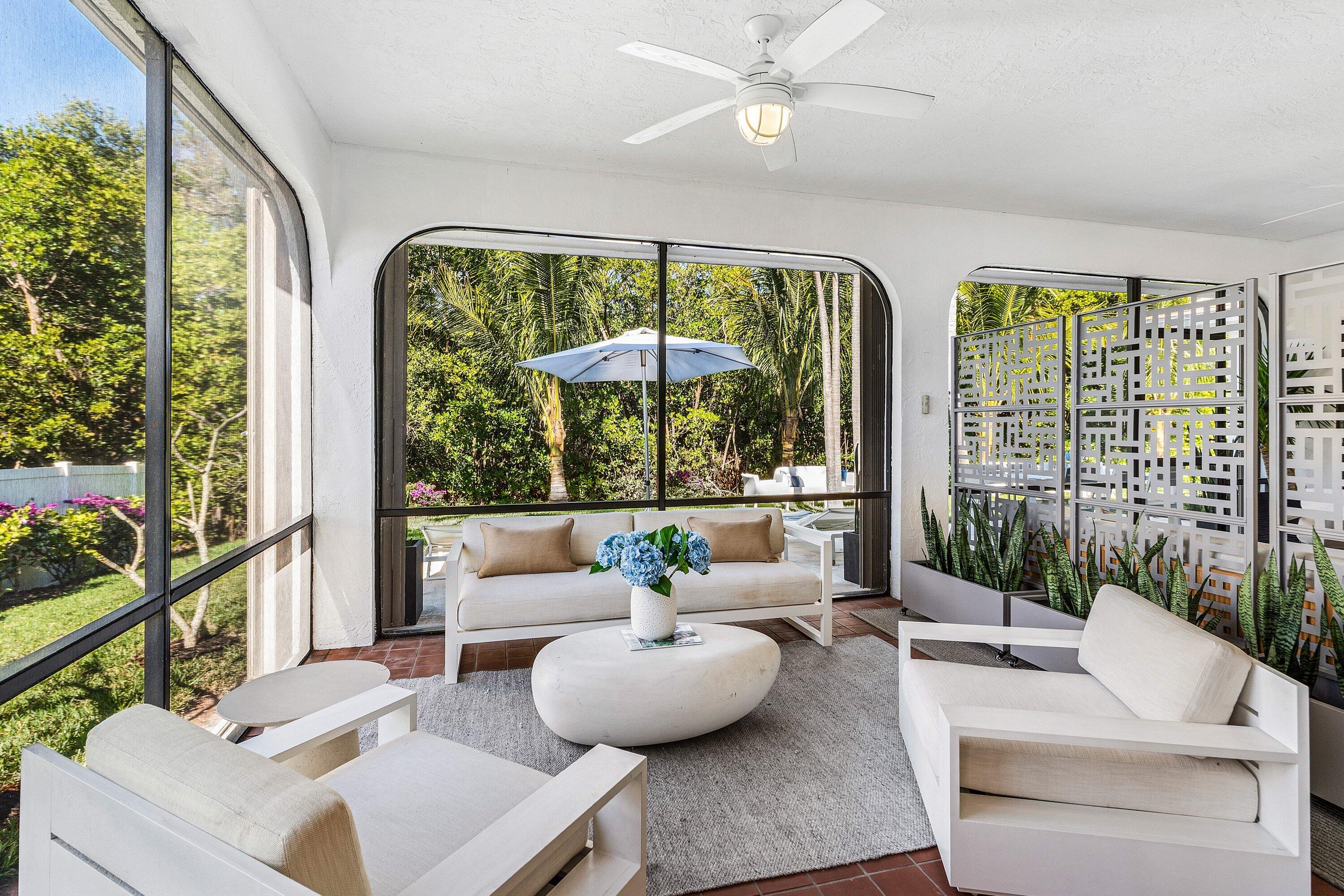 48 Harbour Drive North Ocean Ridge, FL 33435 - Photo 15 of 25 a living room with furniture and a large window