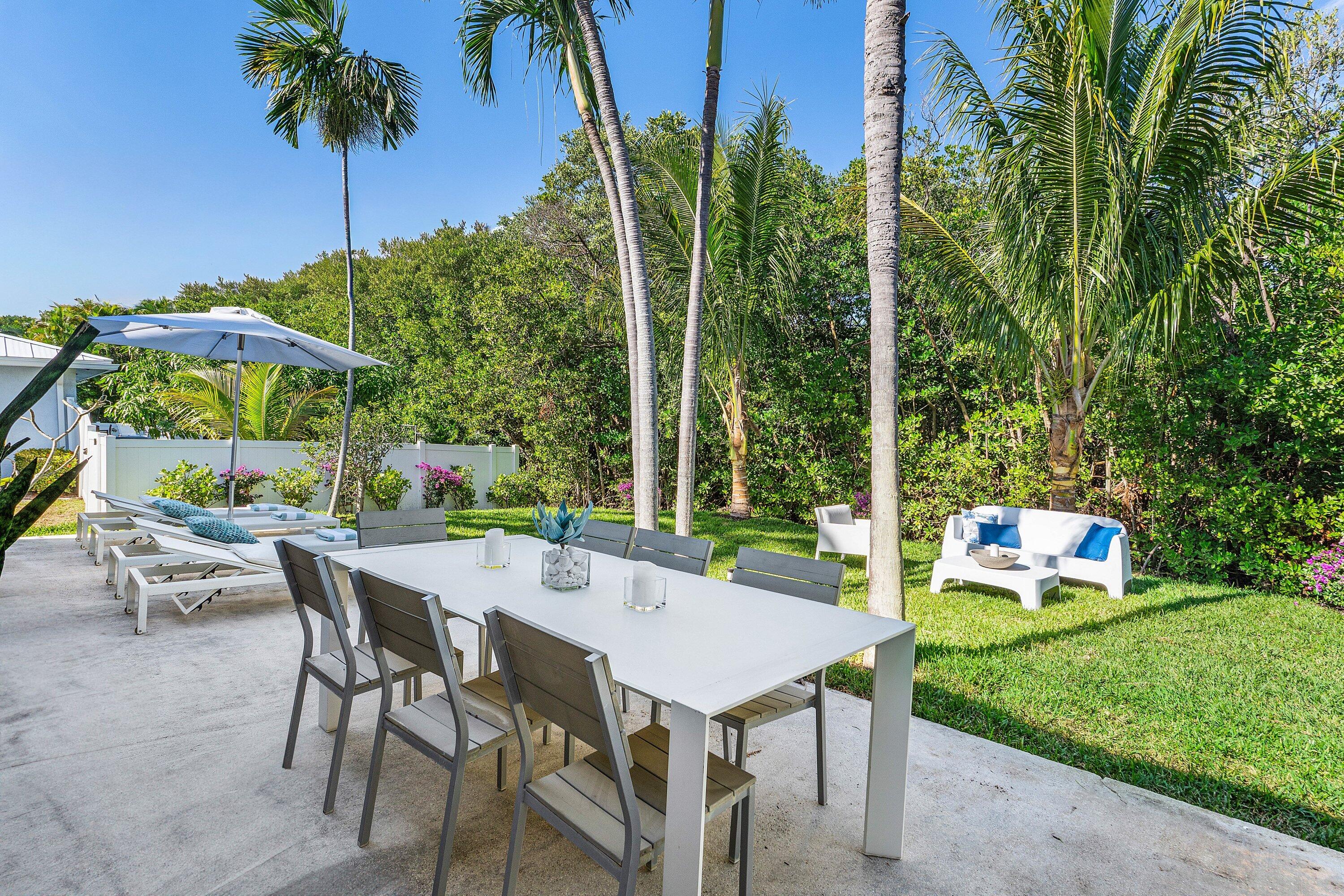 48 Harbour Drive North Ocean Ridge, FL 33435 - Photo 17 of 25 a view of an outdoor sitting area with furniture