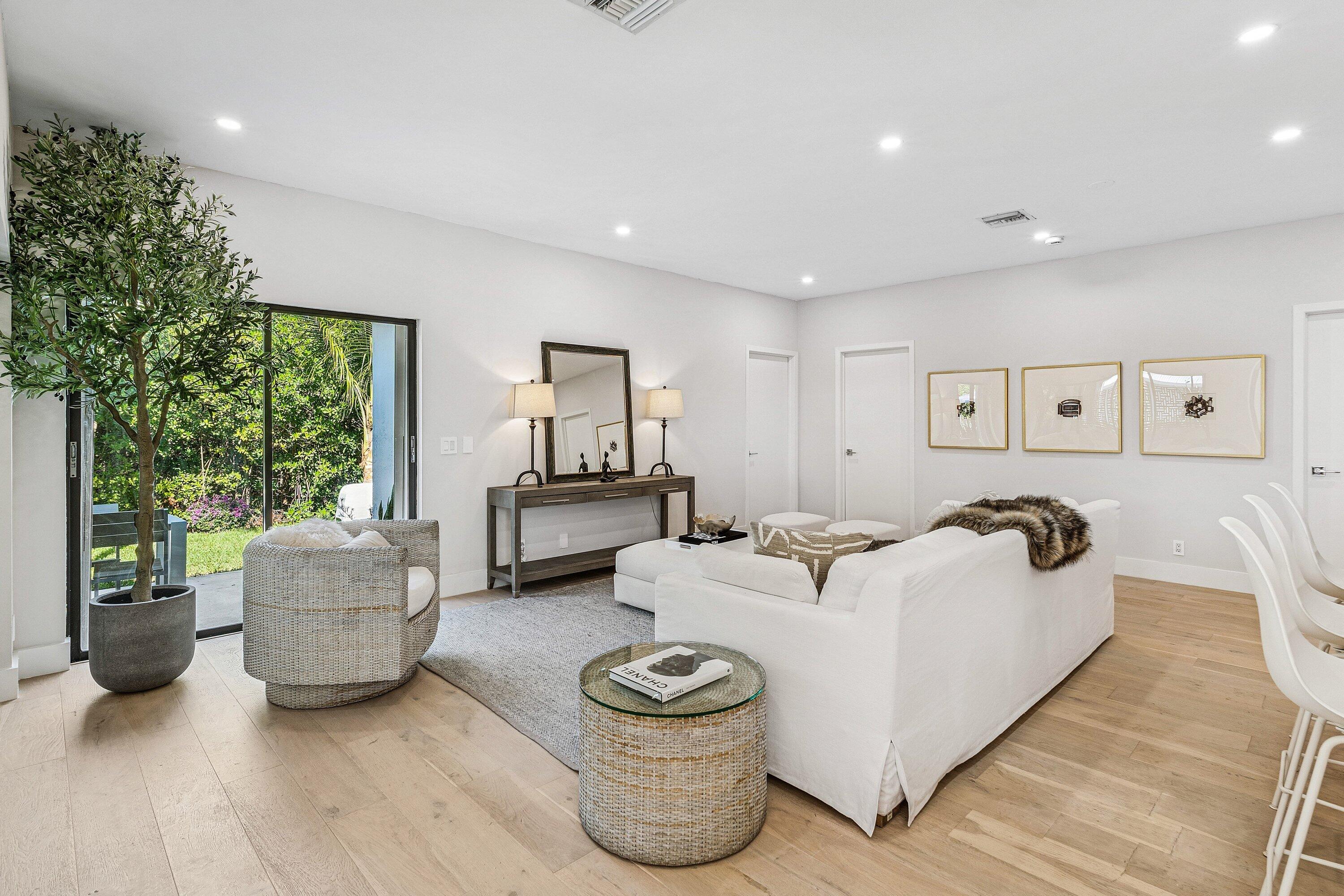 48 Harbour Drive North Ocean Ridge, FL 33435 - Photo 6 of 25 a living room with furniture and a large window