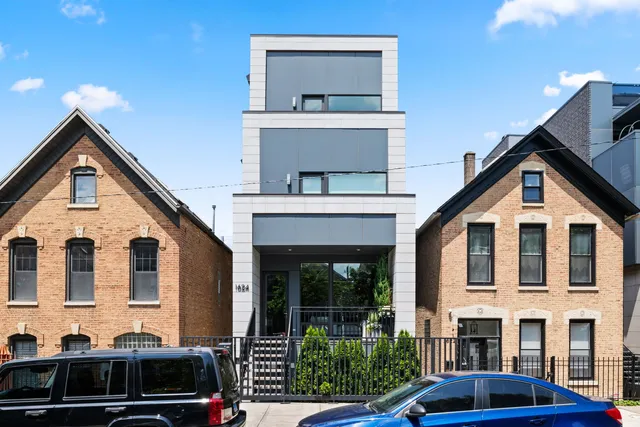 a front view of a house with garage