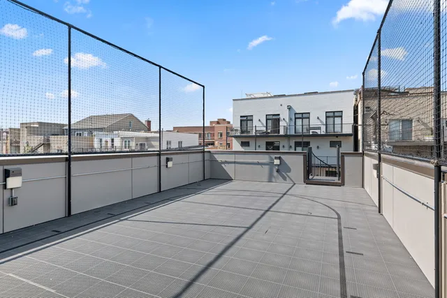 a kitchen with stainless steel appliances a sink counter top space cabinets and a stove