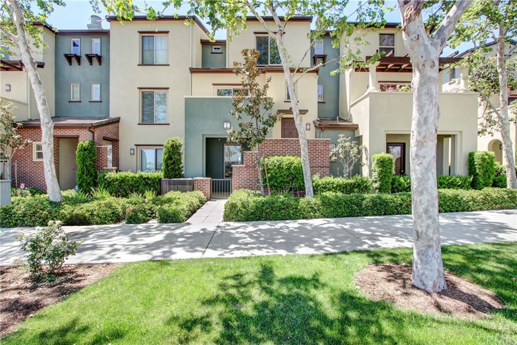 a view of a building with a yard