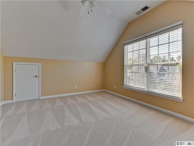 6531 Elfreda Road Charlotte, NC 28270 - Photo 14 of 16 a view of an empty room with a window