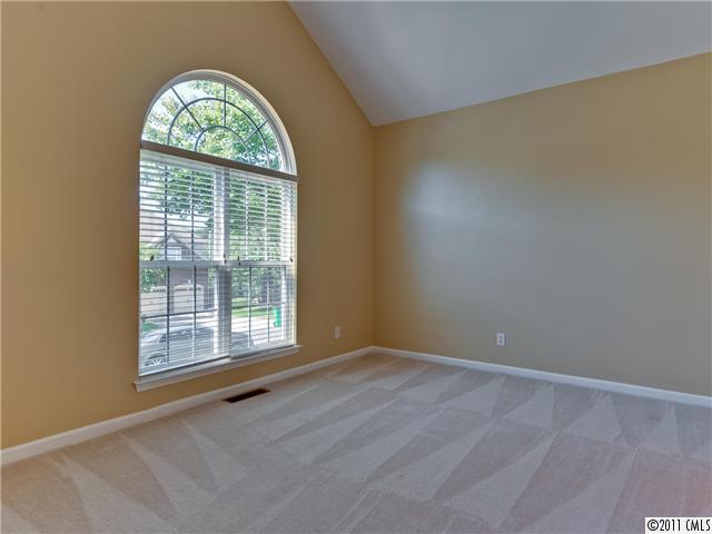 6531 Elfreda Road Charlotte, NC 28270 - Photo 3 of 16 an empty room with a window