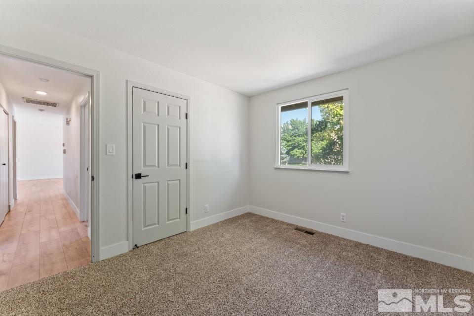 3455 Gull Street Reno, NV 89508 - Photo 23 of 38 an empty room with windows